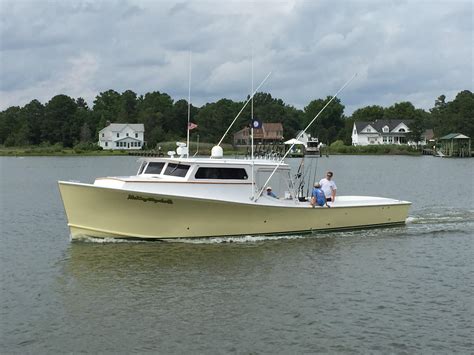 -Four rocket launchers along the top's aft edge, the console sports rod holders mounted at waist level &173; three on each. . Deadrise boats for sale by owner